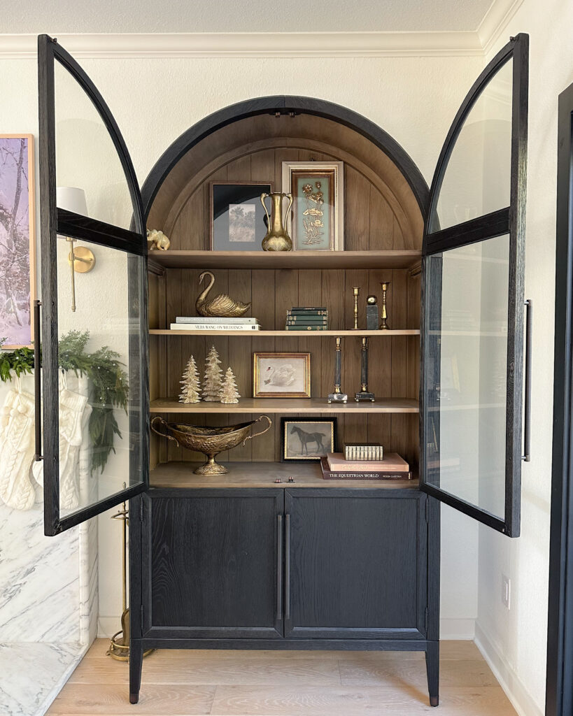 Home for the Holidays: Black Friday Deals on Chic Decor and Finds | black cabinet, glass cabinets, wooden cabinet, living room, christmas, decor