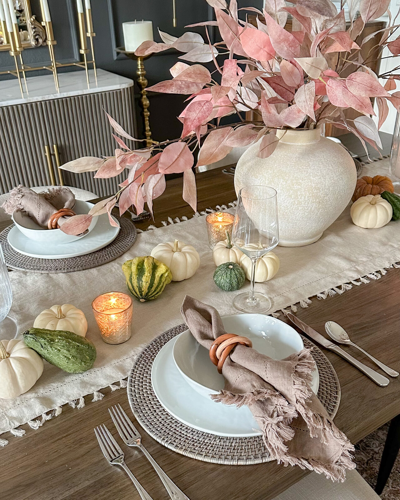 Celebrating in Style: Thanksgiving Tablescapes, Fashion Finds & More | fall tablescape, autumn faux florals, tablescapes, thanksgiving tablescapes, thanksgiving decor, wine glasses, napkin rings, placemats