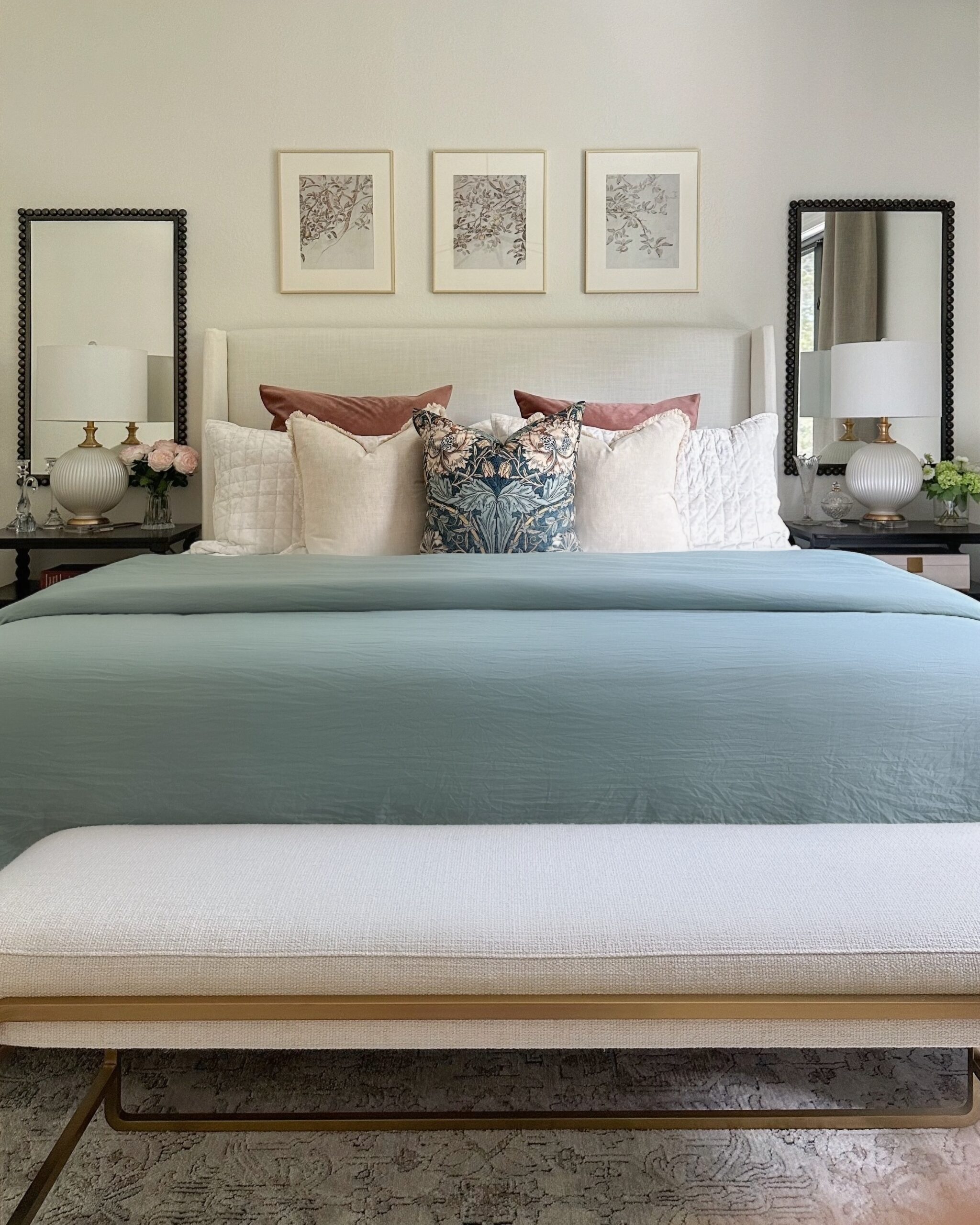 The Ultimate Bedding Guide: Essentials for Your Best Sleep Yet | bedding, quilt, pillows, throw pillows, floral pillow, duvet, blue duvet, sage green bedding, accent bench, bedroom inspo, neutral bedding, neutral tones