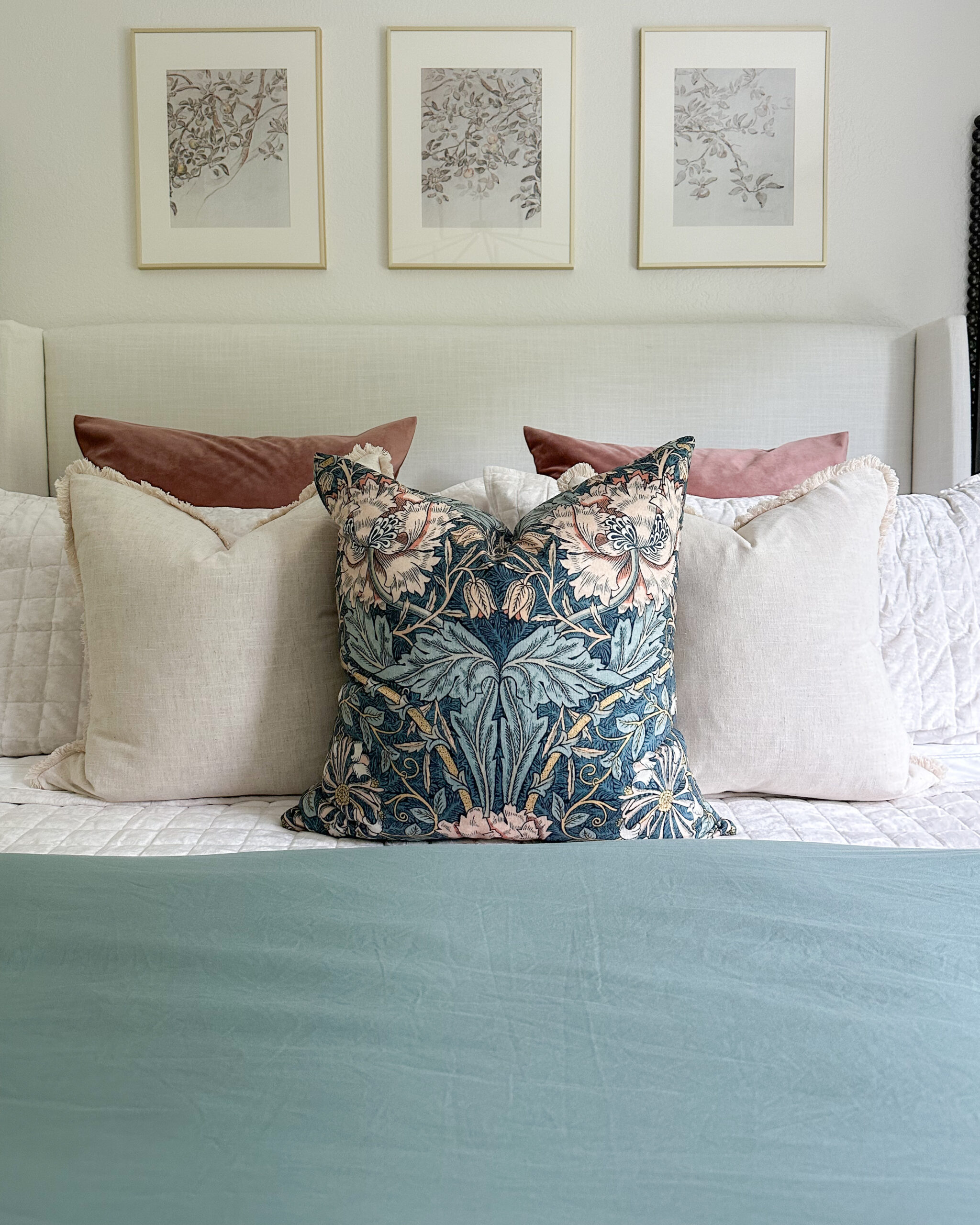 The Ultimate Bedding Guide: Essentials for Your Best Sleep Yet | bedding, quilt, pillows, throw pillows, floral pillow, duvet, blue duvet, sage green bedding, bedroom inspo, earth tones